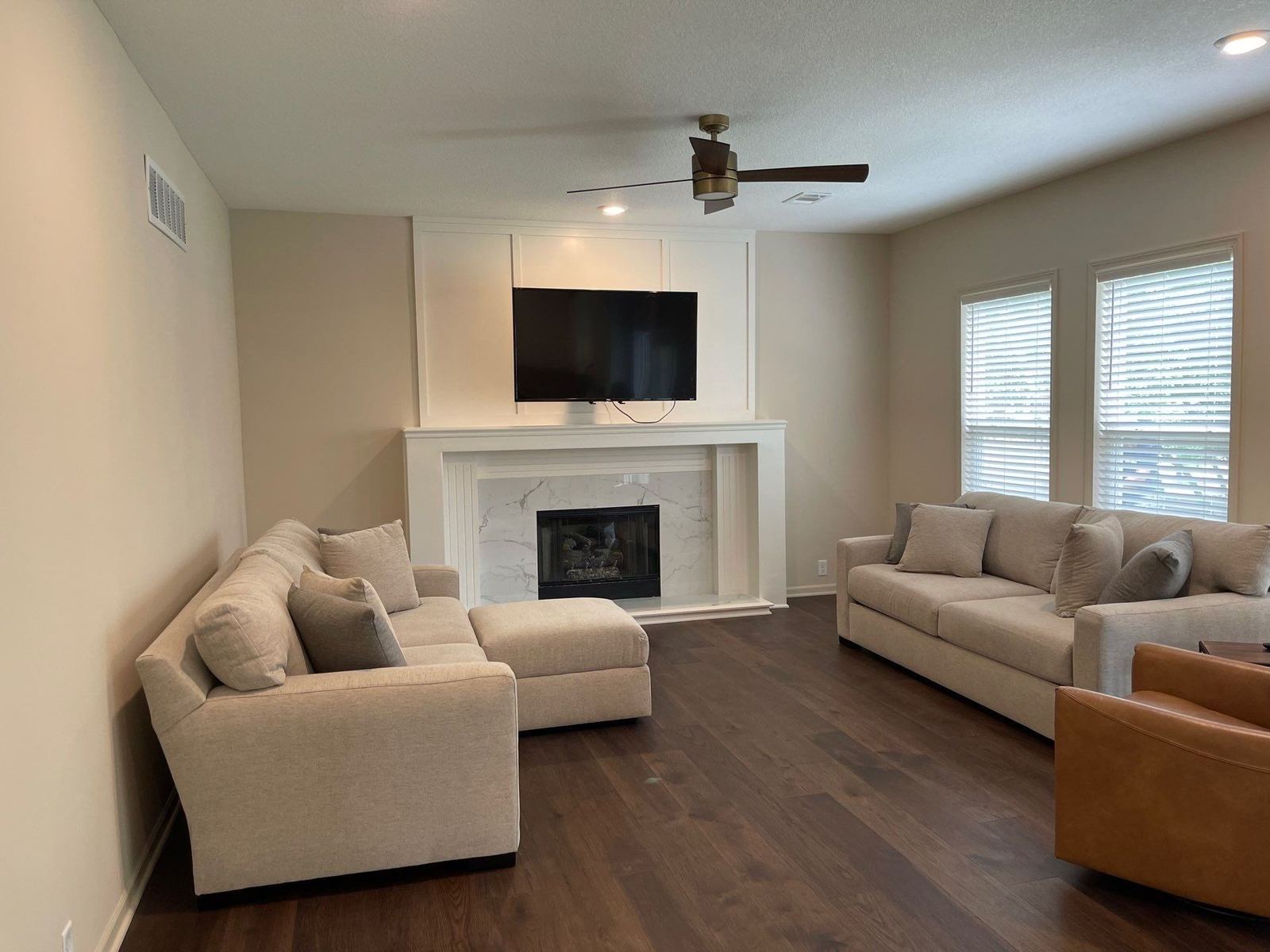 Finished basement living space by Uprise Remodeling